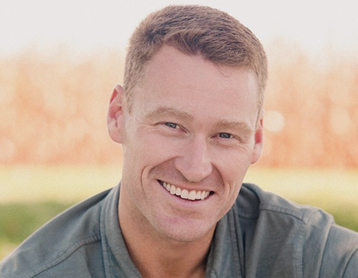 a man with a smile on his face