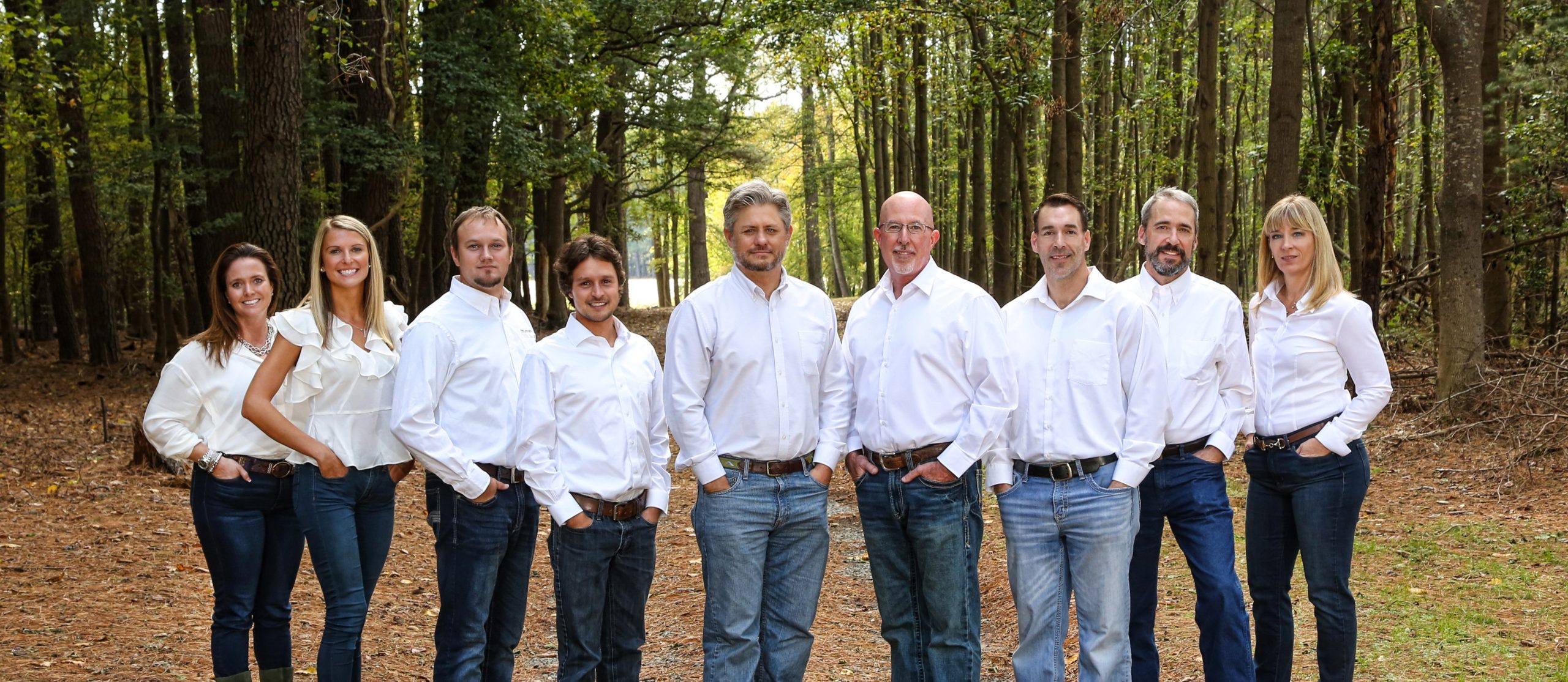 a group of people standing next to each other