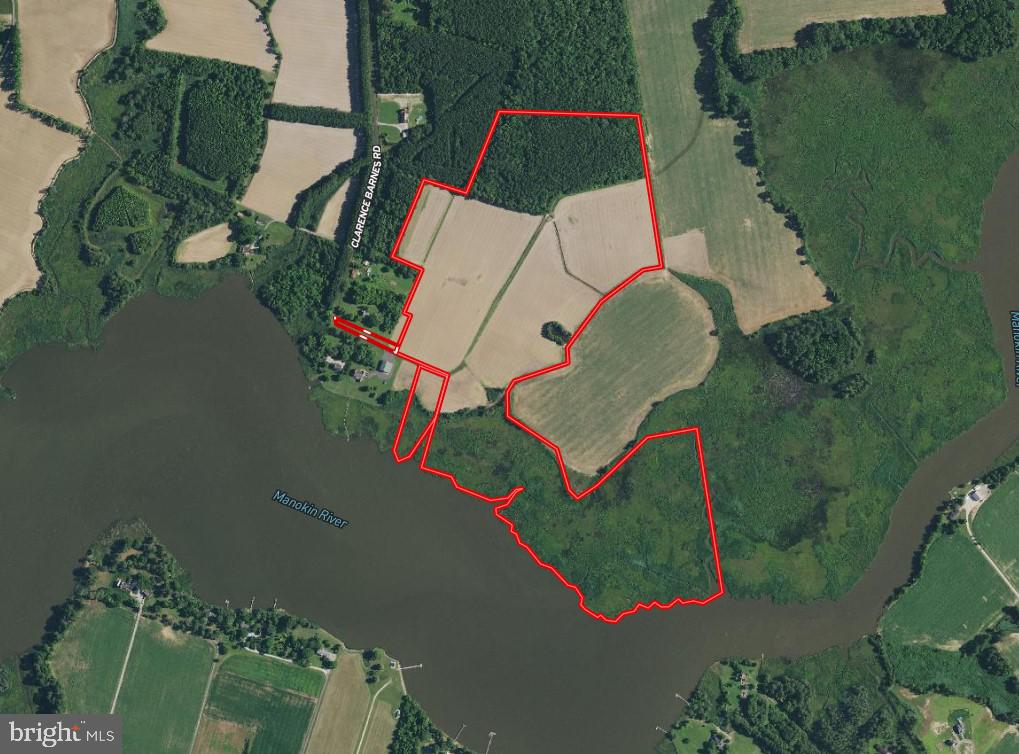 an aerial view of a land with a red line in the middle of it