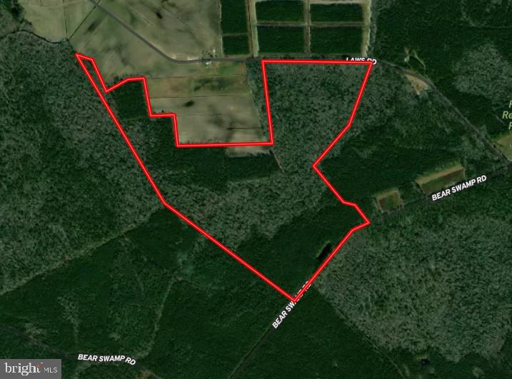 a map of a wooded area with a red line