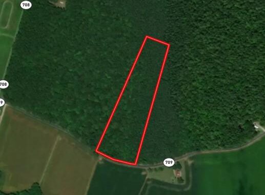 a map of a field with a red line in the middle of it