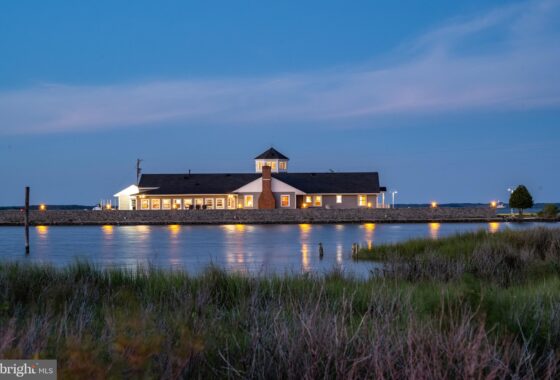 a large building sitting on top of a body of water