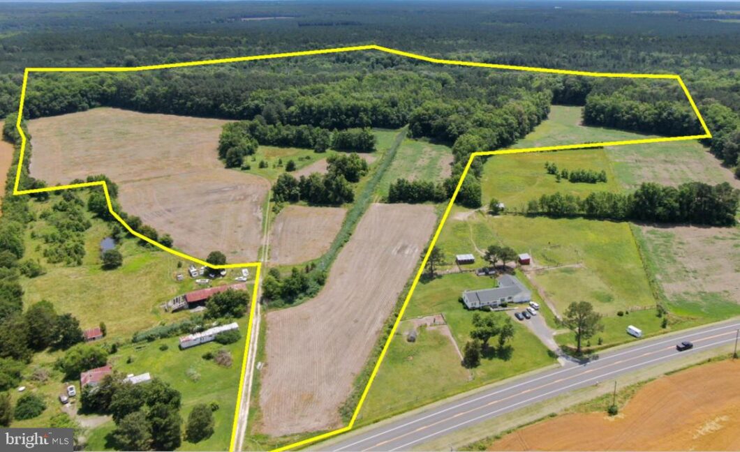 an aerial view of a lot in a rural area