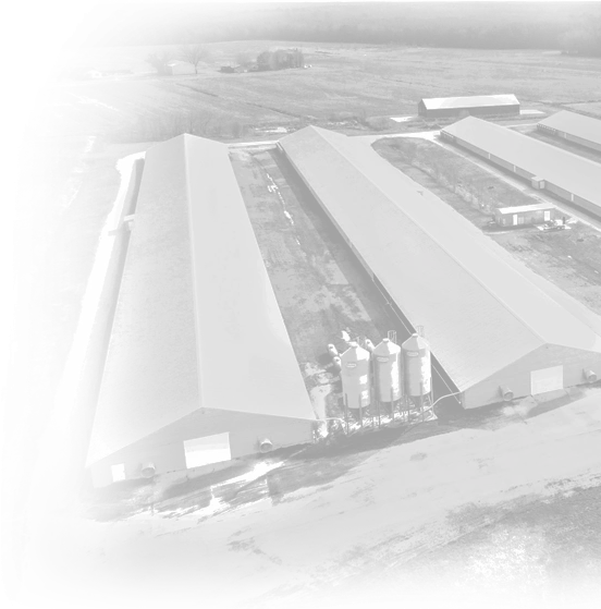 a black and white photo of a factory building